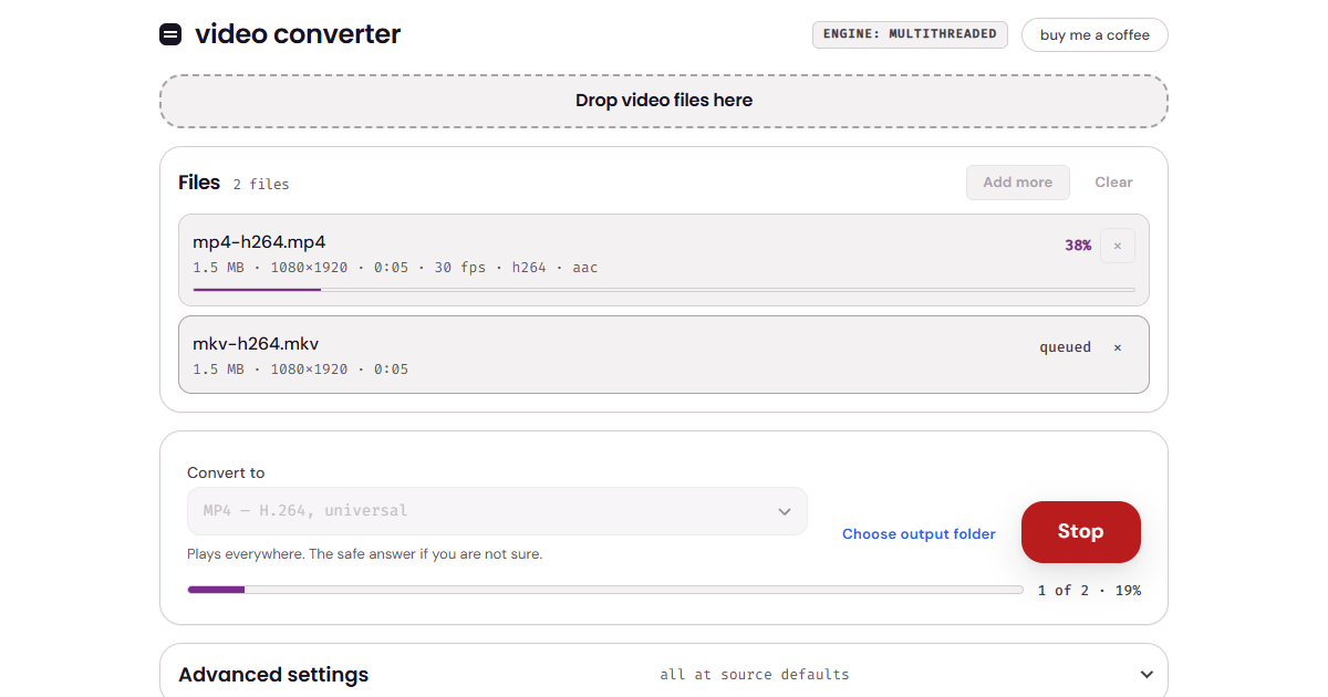 The video converter with two files in the list, one converting and one queued, the output format set to MP4.